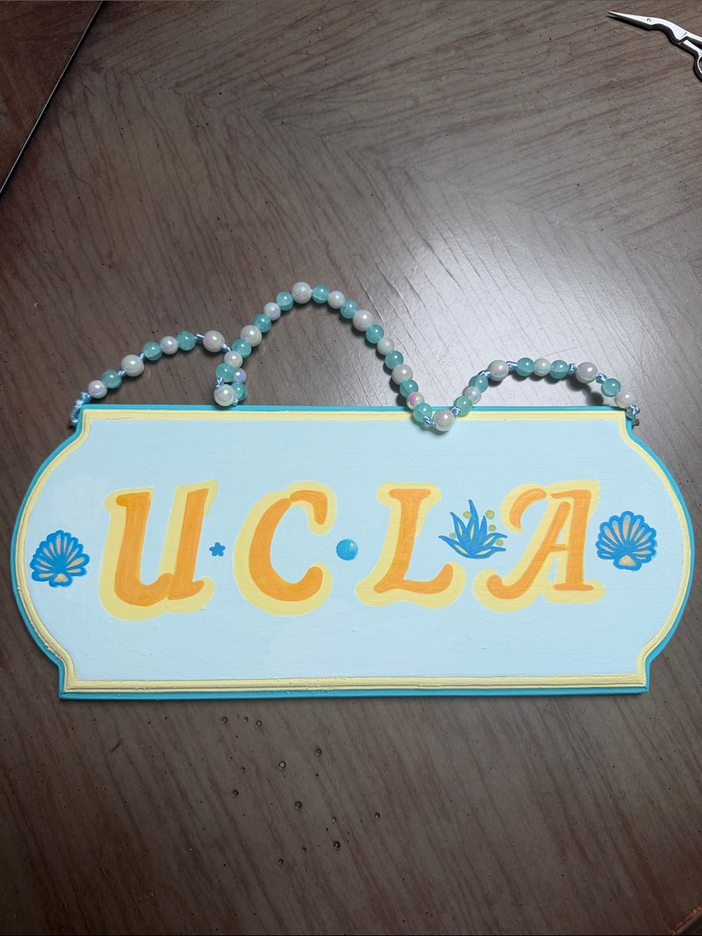 UCLA Decorative Wall Sign in Light Blue and Yellow